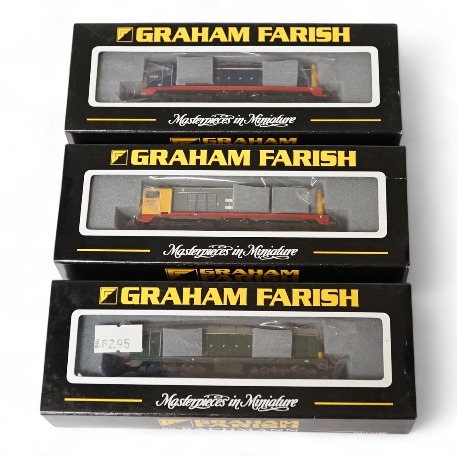 Three boxed Graham Farish N gauge railway Class 20 diesel locomotives; D8134 (371-026), 20227 (371-027) and 20906 (371-025). Condition - good.